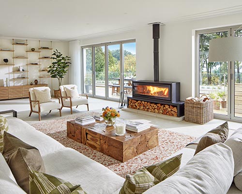 contemporary lounge with wood burner © OMAZE /RSPCA