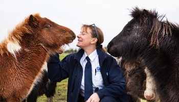 RSPCA inspector with horses © RSPCA
