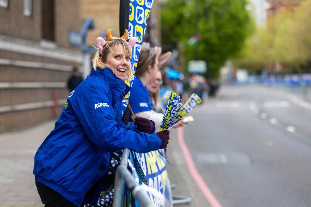 RSPCA staff and volunteers at the London Marathon RSPCA cheer point near mile 14.