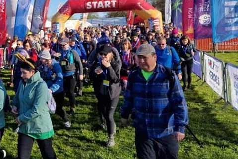 Fundraisers at the start line of an organised trekking event.