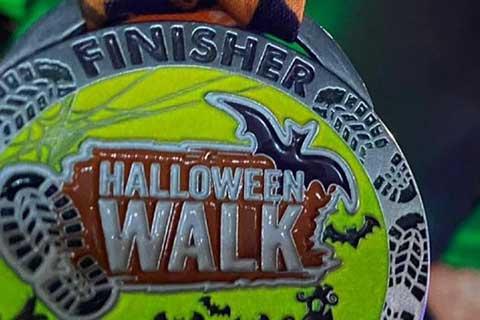 Finisher medal for the Halloween charity walk.